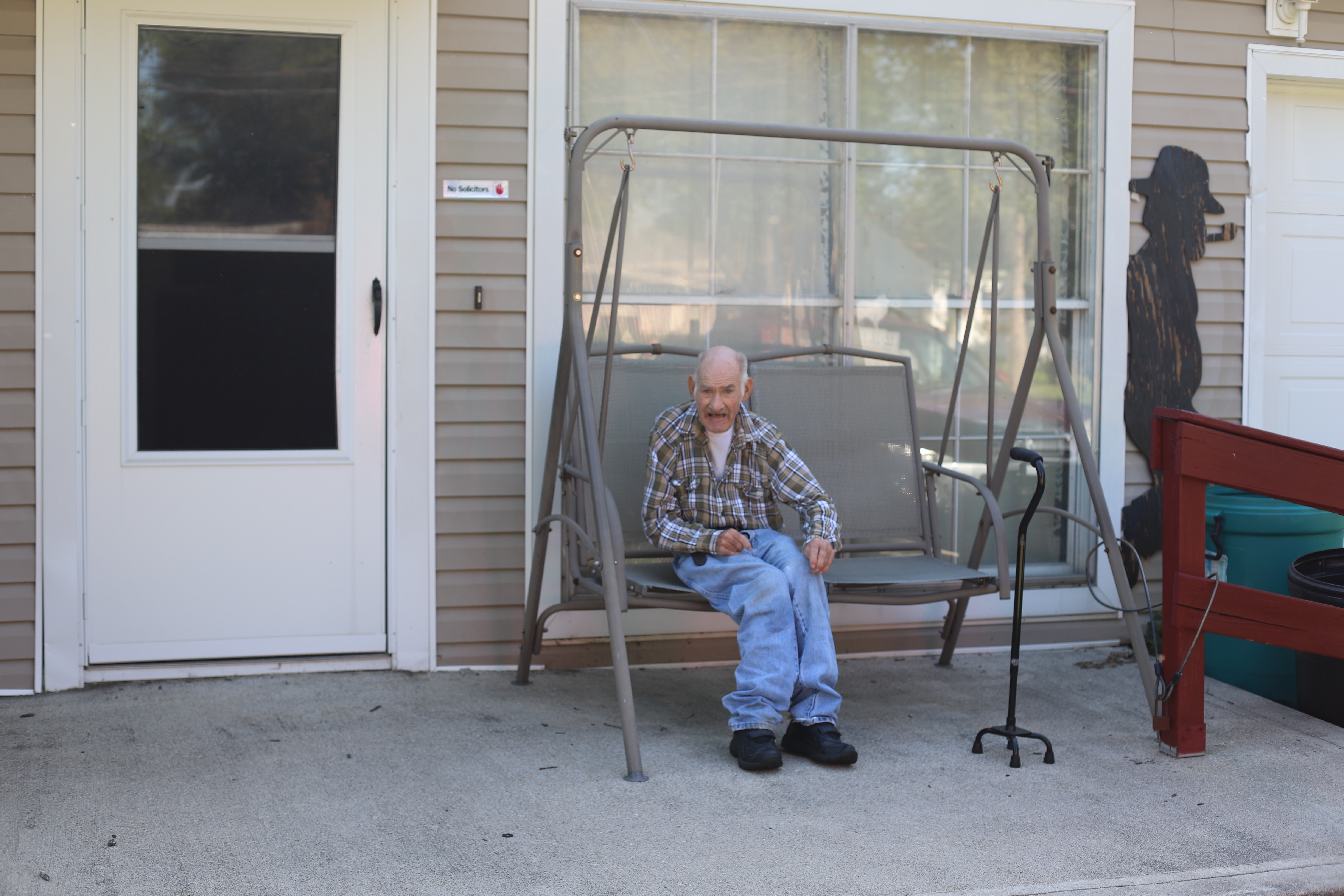 Eddie on the front porch of his beautiful home