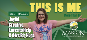 Maggie giving air hugs on a billboard.