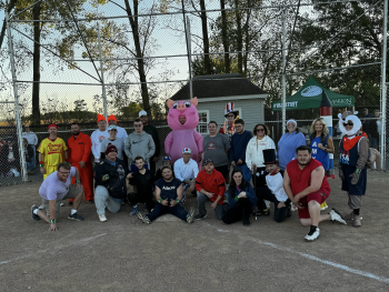 Kickball Teams pose for a picture after the game