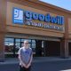 Sean Sullivan stands in front of the Goodwill building where he works