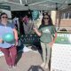 Two Service and Support Administration enjoy the festivities at the Downtown Marion Third Thursday while promoting the work of MCBDD.